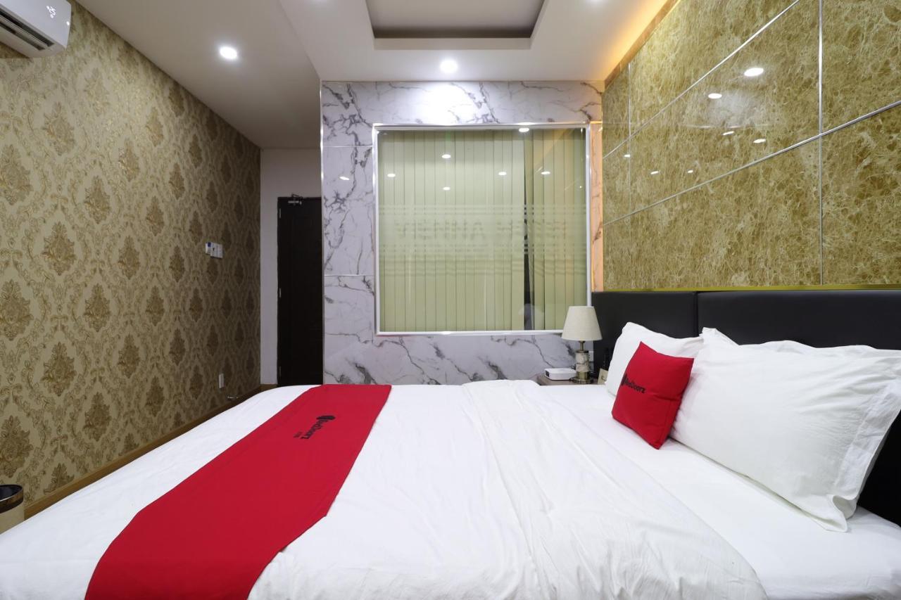 RedDoorz Plus Vienna Hotel Ho Chi Minh-stad Buitenkant foto