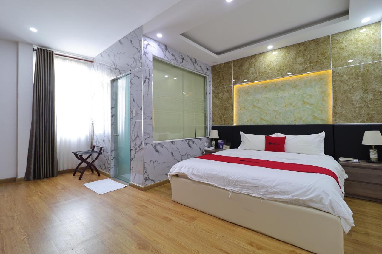 RedDoorz Plus Vienna Hotel Ho Chi Minh-stad Buitenkant foto