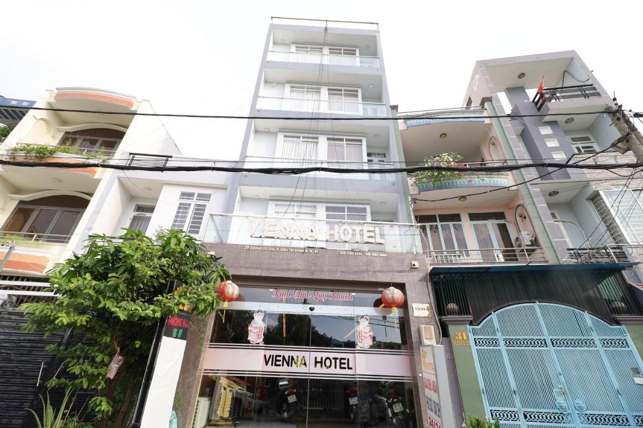 RedDoorz Plus Vienna Hotel Ho Chi Minh-stad Buitenkant foto